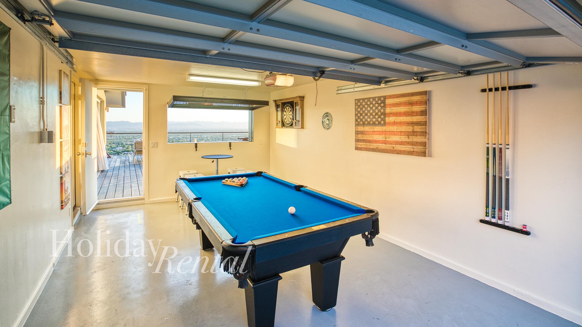 Game room with billiards table and darts