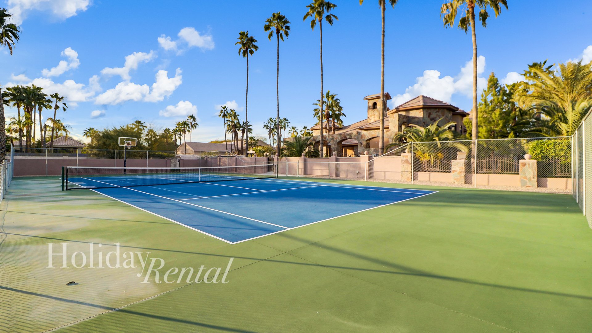 Sport court with tennis, pickleball, and basketball