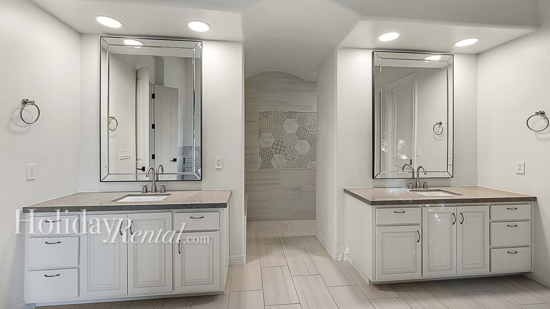 Primary Bath - Spacious bathroom with double vanity, large tub, and walk in shower.