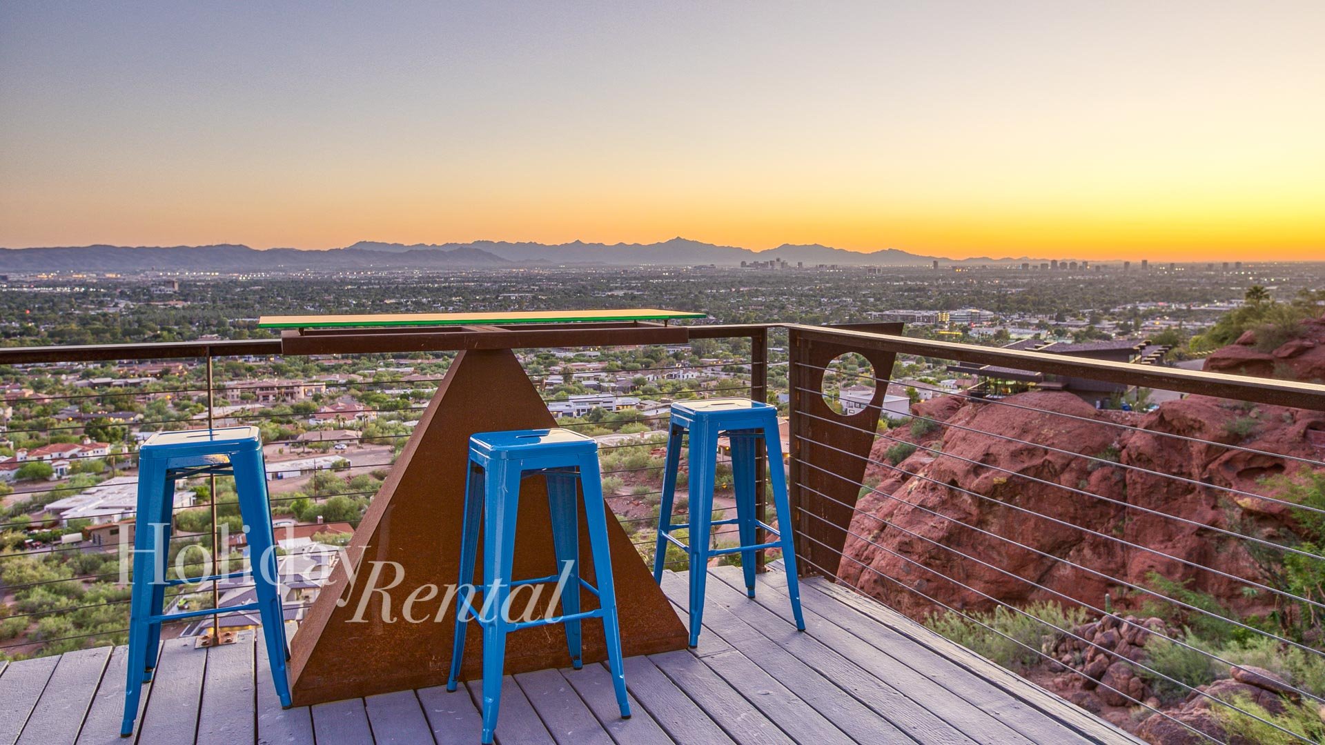 Glass bar top and stools to enjoy sunset views.